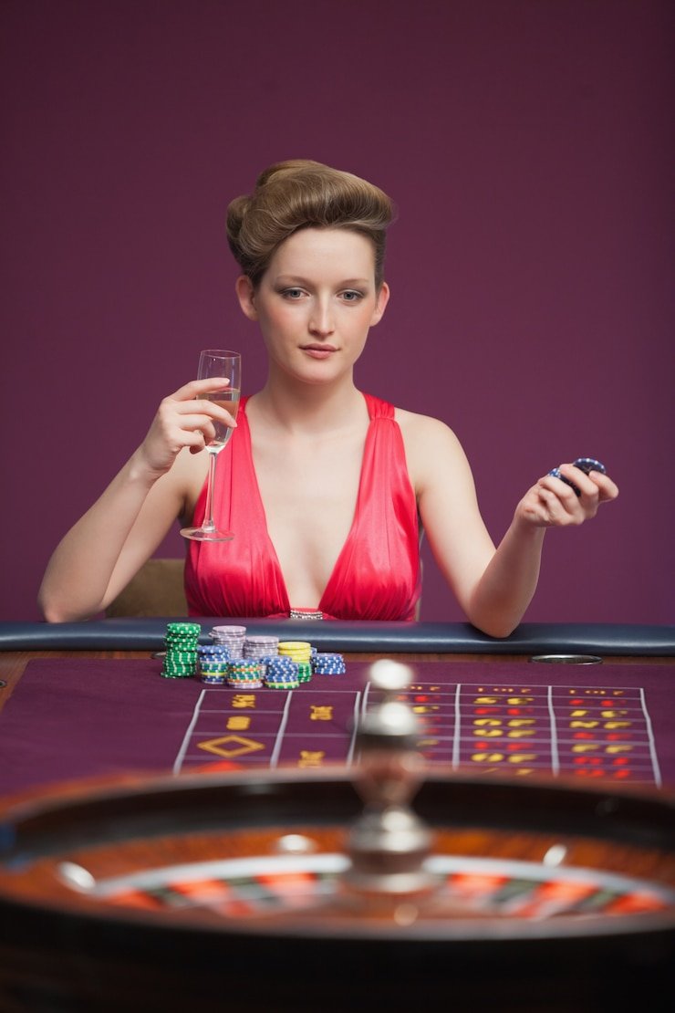 Live dealer at zodia card table streaming in HD from professional studio with multiple camera angles